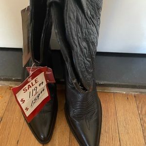Black cowboy boots by ARIAT . NEVER WORN originally $159. Paid $119 Size 7B